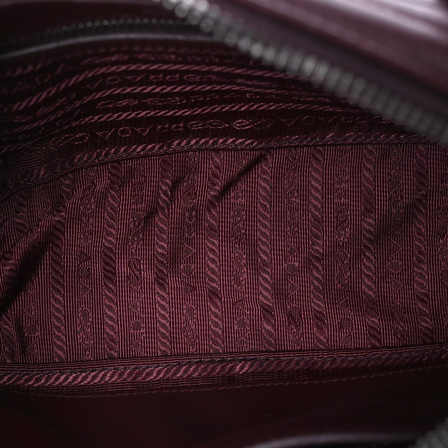 Prada Soft Calfskin Impunture Diagramme Camera Bag  Granato